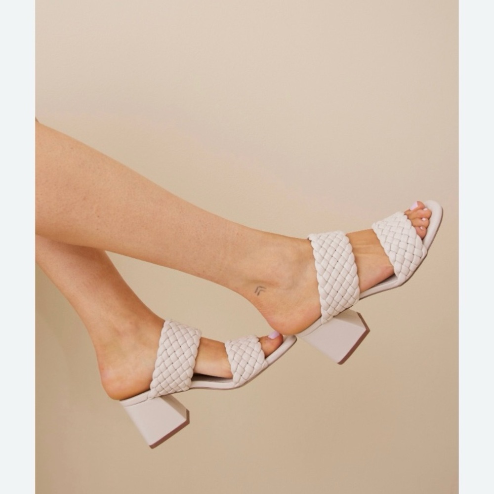 Steve Madden cream block heel sandals.